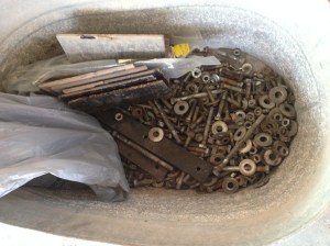 Bolts from the bus seats. I don't know if you can tell, but there are a lot! 7 bolts per seat!