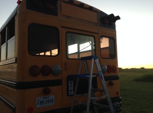 Back of Chitty Bang: After School Bus Sign, Emergency Door Lettering, and reflective tape all removed via heat gun and paint scraper..and a ladder...and a stepstool...