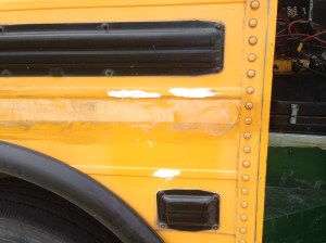 Some random screw holes covered with polyurethane caulk. Bondo would work well here too.