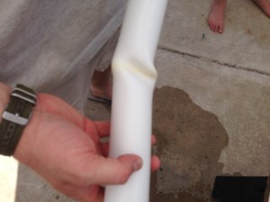 Twisting the hot PVC Section. 